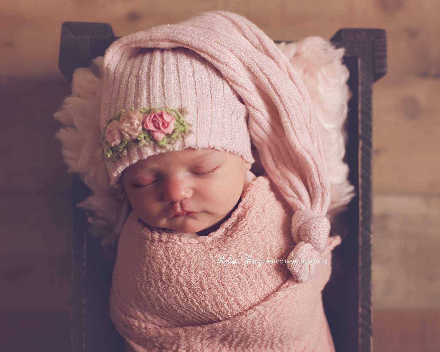 newborn-photography-baby-girl-pink-sleeping-hat-shelby-township-mi