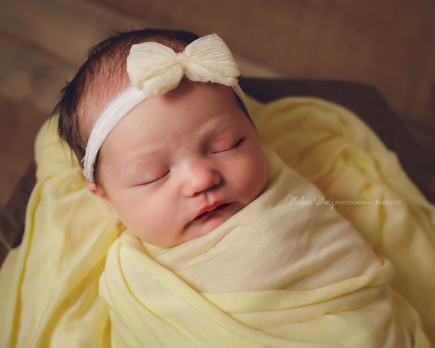 newborn-photography-baby-girl-yellow-bow-shelby-township-mi