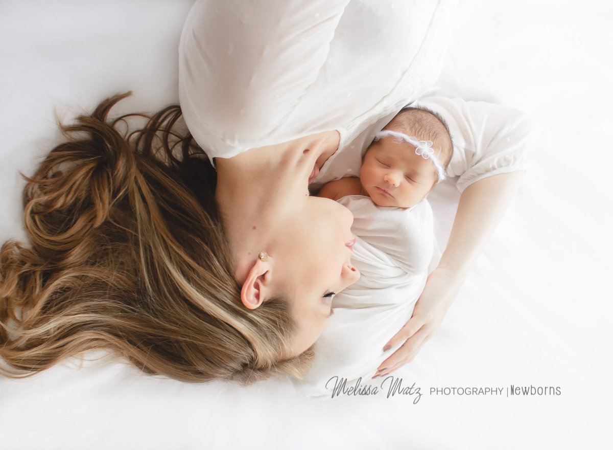 mom and newborn baby girl together newborn photo session Bloomfield Hills Mi