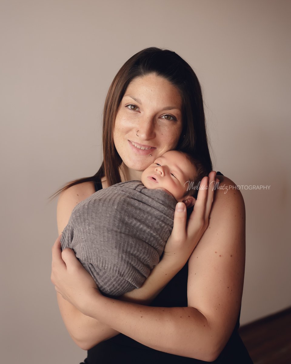oakland-county-newborn-photographer-newborn-baby-boy-in-mama's-arms