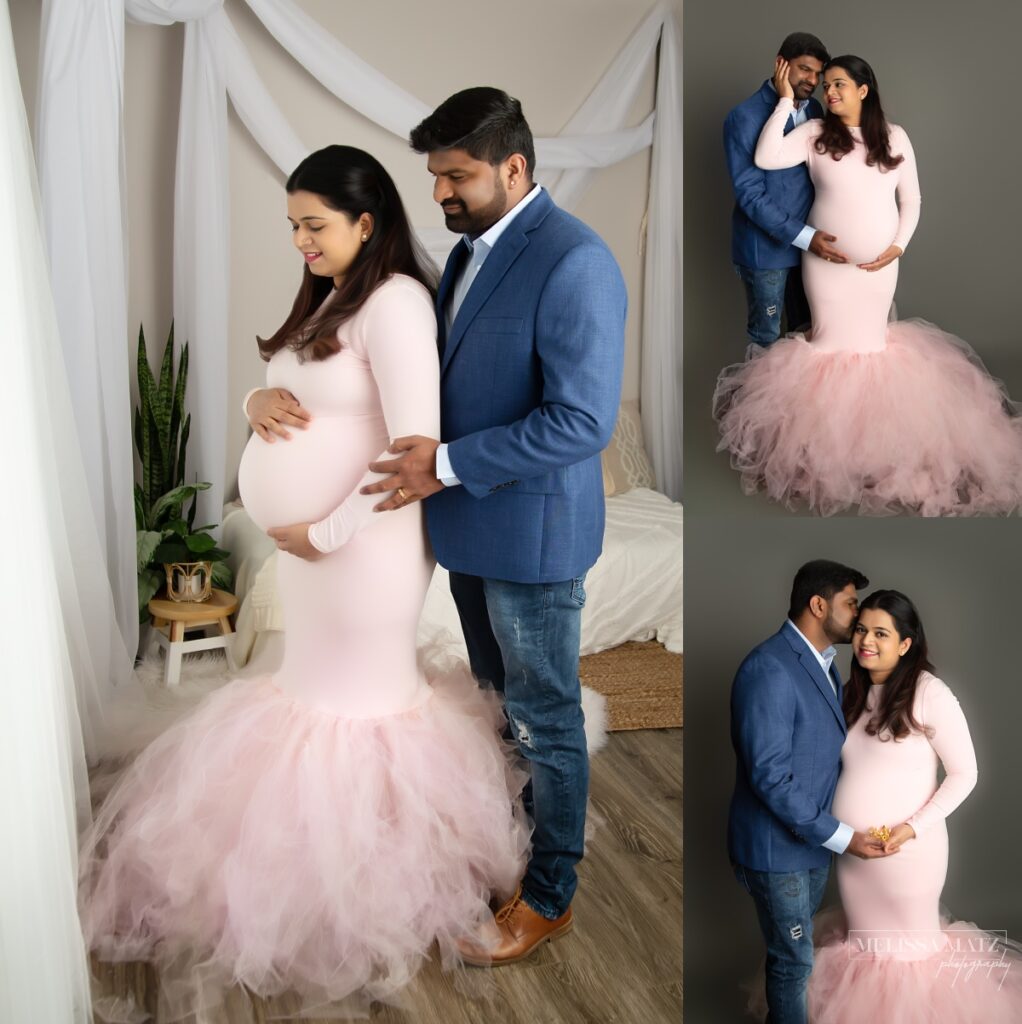 maternity session image of parents to be in a suit and pink gown against a grey backdrop
