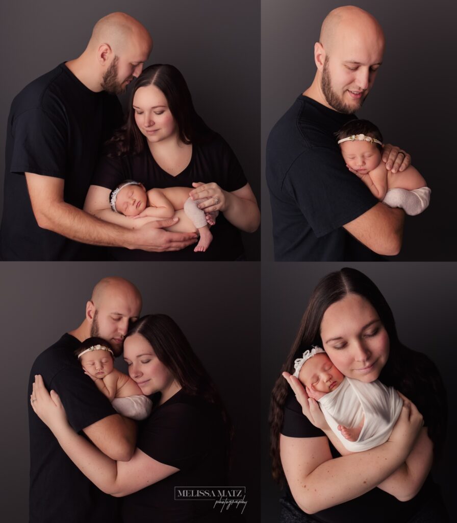 tiny newborn baby girl held by her parents during her newborn photo session