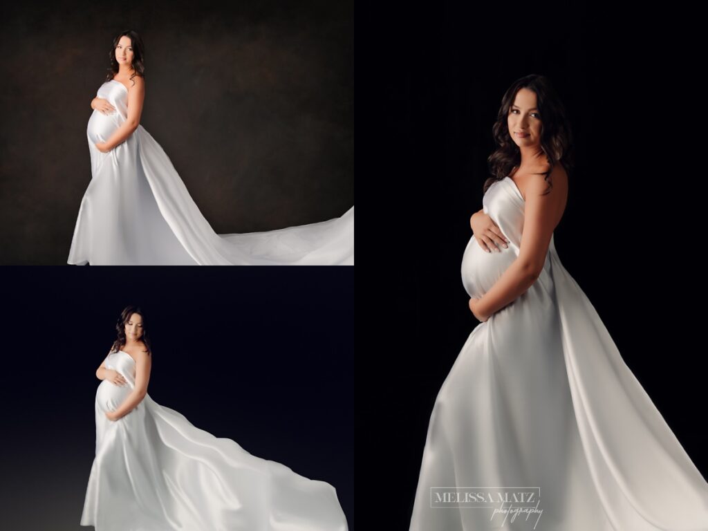 maternity portraits of mom to be draped in white flowing fabric accentuating her growing baby bump done in shelby township mi photo studio