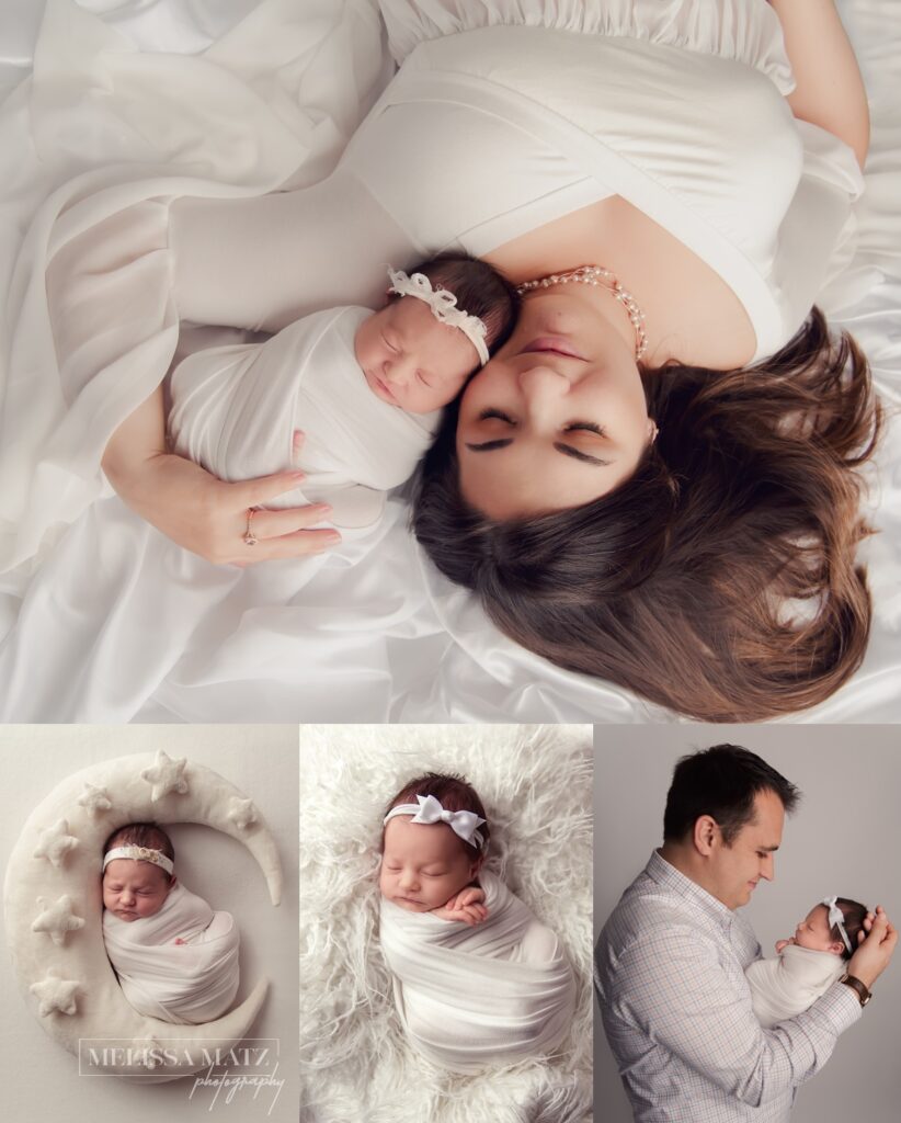 newborn baby girl swaddle wrapped in white being held lovingly by mom and dad in shelby township mi photography studio