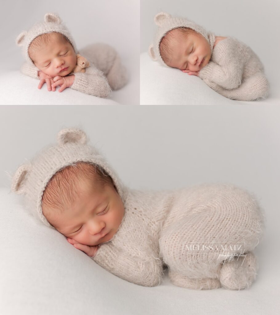 newborn baby boy in a bear bonnet and fuzzy romper sleeping with a tiny teddy bear in shelby township newborn photography studio