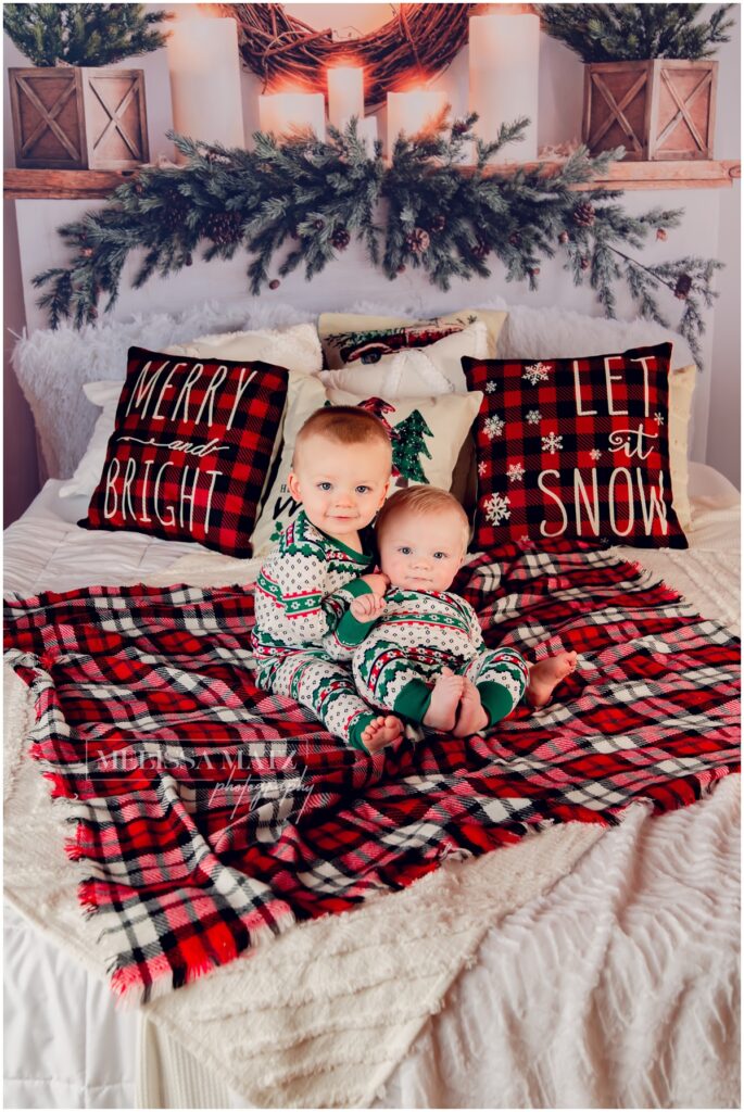 holiday pajama scene with two little ones at a photgraphy studio in Shelby Township by a metro detroit photographer