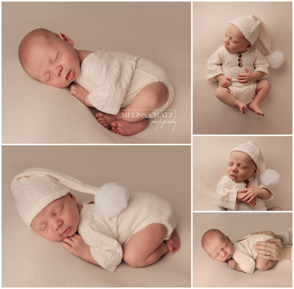newborn baby in white romper with sleeping hat during his shelby township mi photography session
