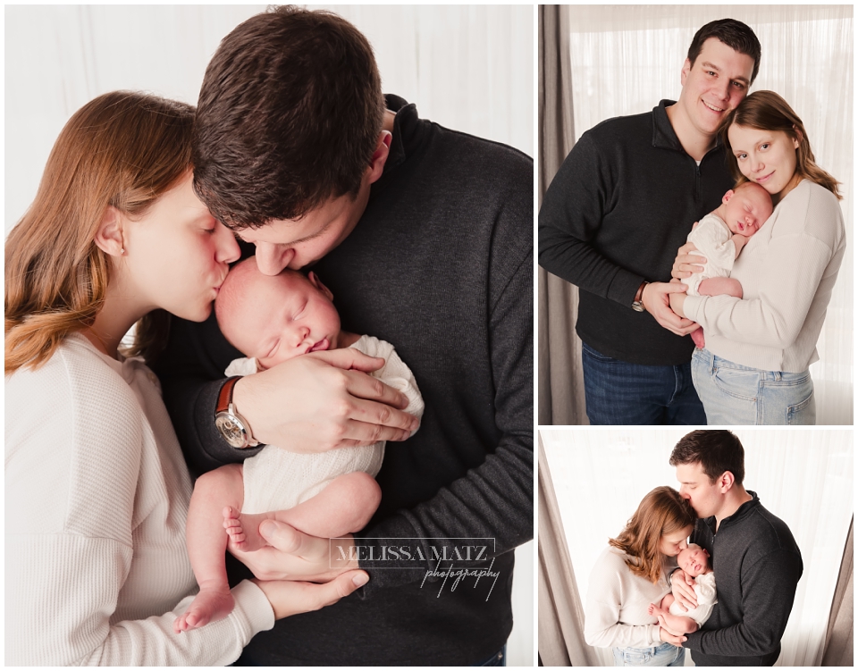 parents cradling their newborn baby in shelby township mi
