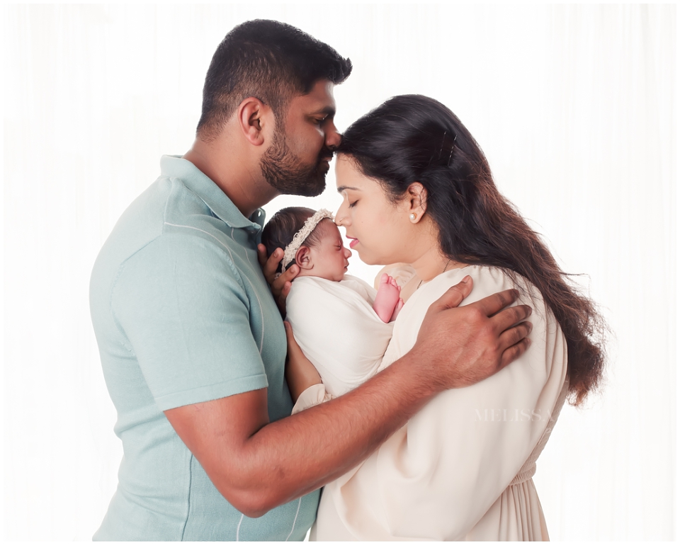 Backlit newborn photo showing soft lighting style in macomb county mi newborn studio