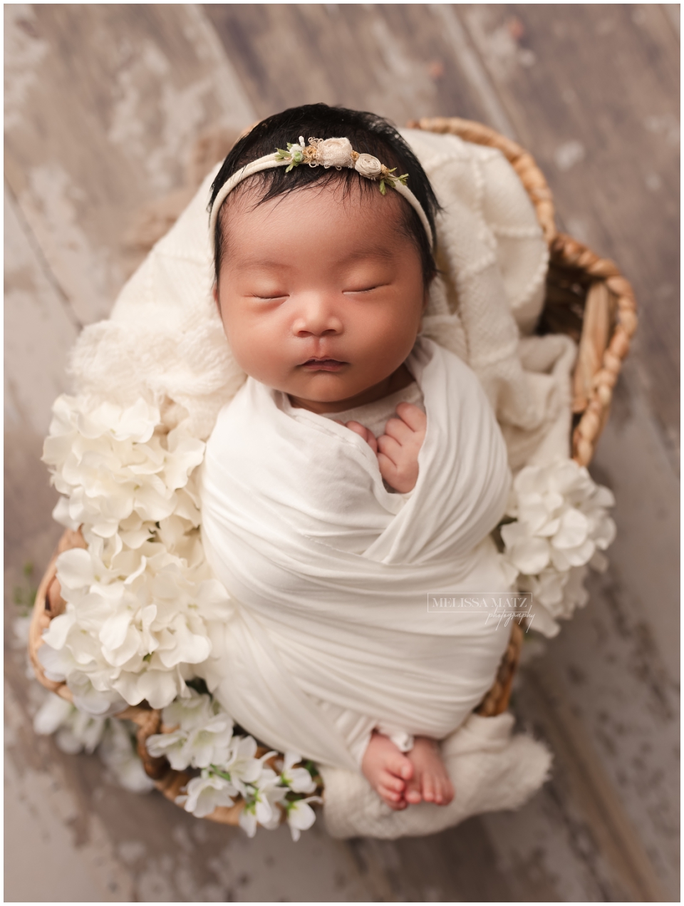 Newborn baby photo session in metro detroit basket flowers