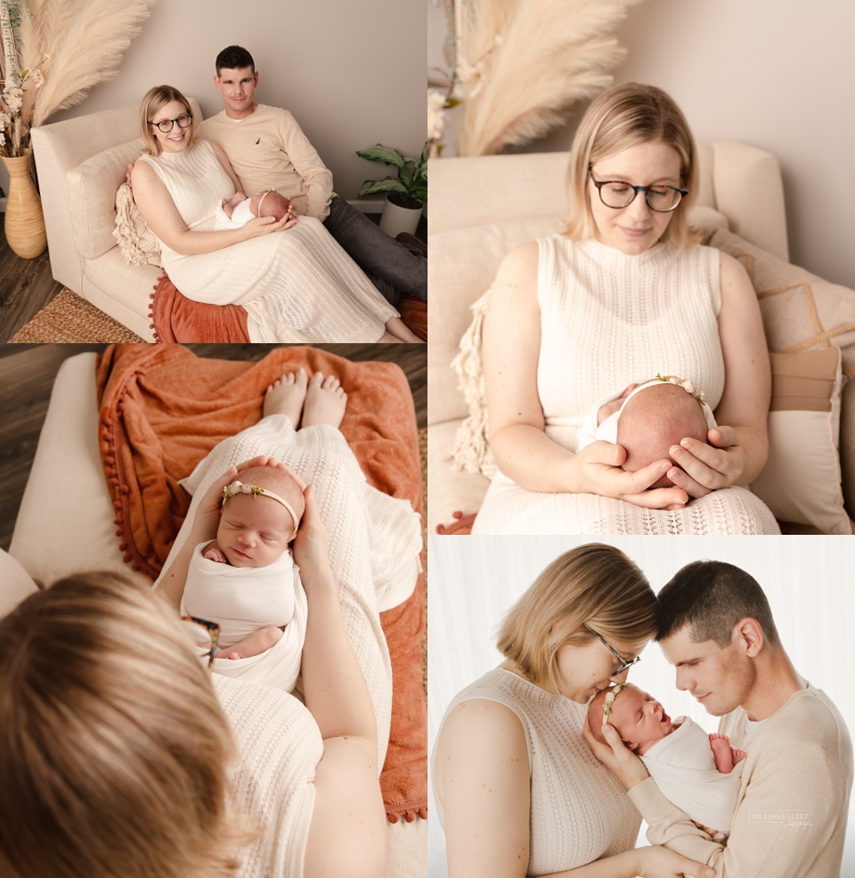 Newborn photography featuring parents and baby in a relaxed, natural pose